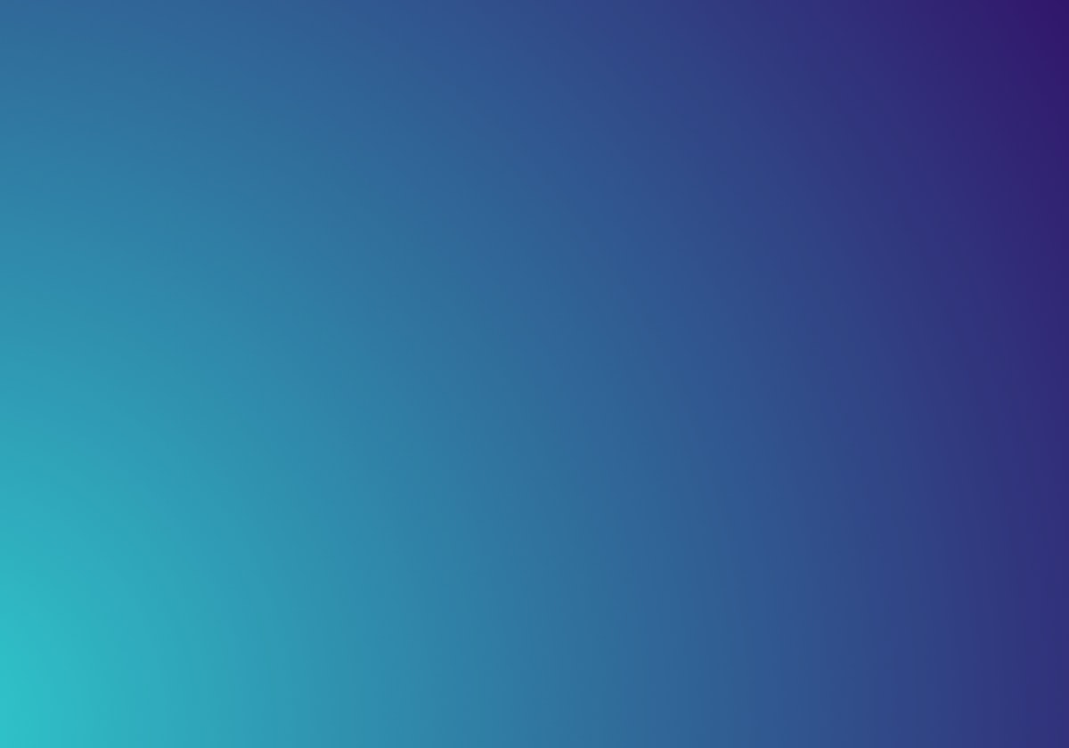 Modern mechanical keyboard on a minimal desk with computer monitor in background